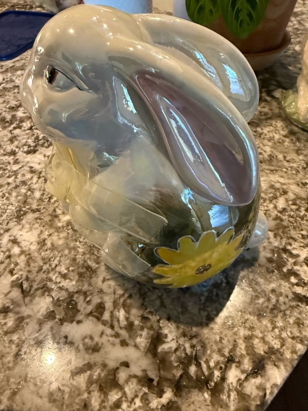 Glossy Ceramic Bunny Figurine with Yellow Flower Accent